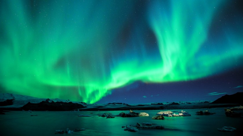 See the incredible colors of Northern Lights in Iceland during winter